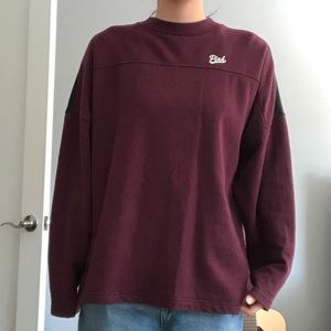 Purple sweater form Pink